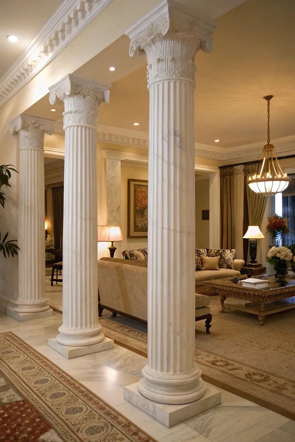 White marble fluted columns adding classical elegance to a modern living room.