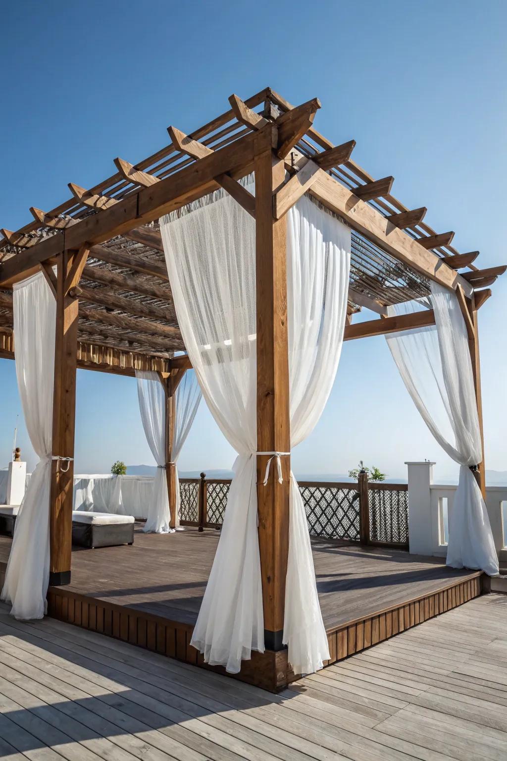 Elevate your deck with a pergola and drapes – a perfect blend of craftsmanship and elegance.