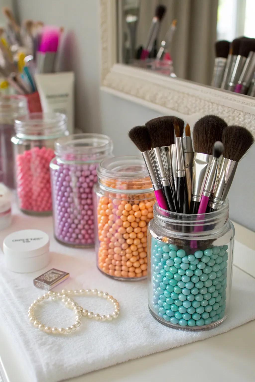 Elegant glass jars with beads make a chic and functional display for makeup brushes.