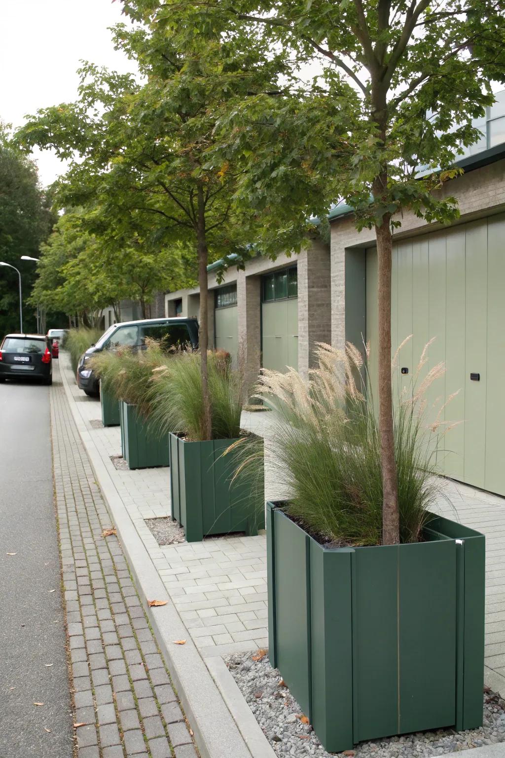 Tall planters creating a grand entrance to the garage.