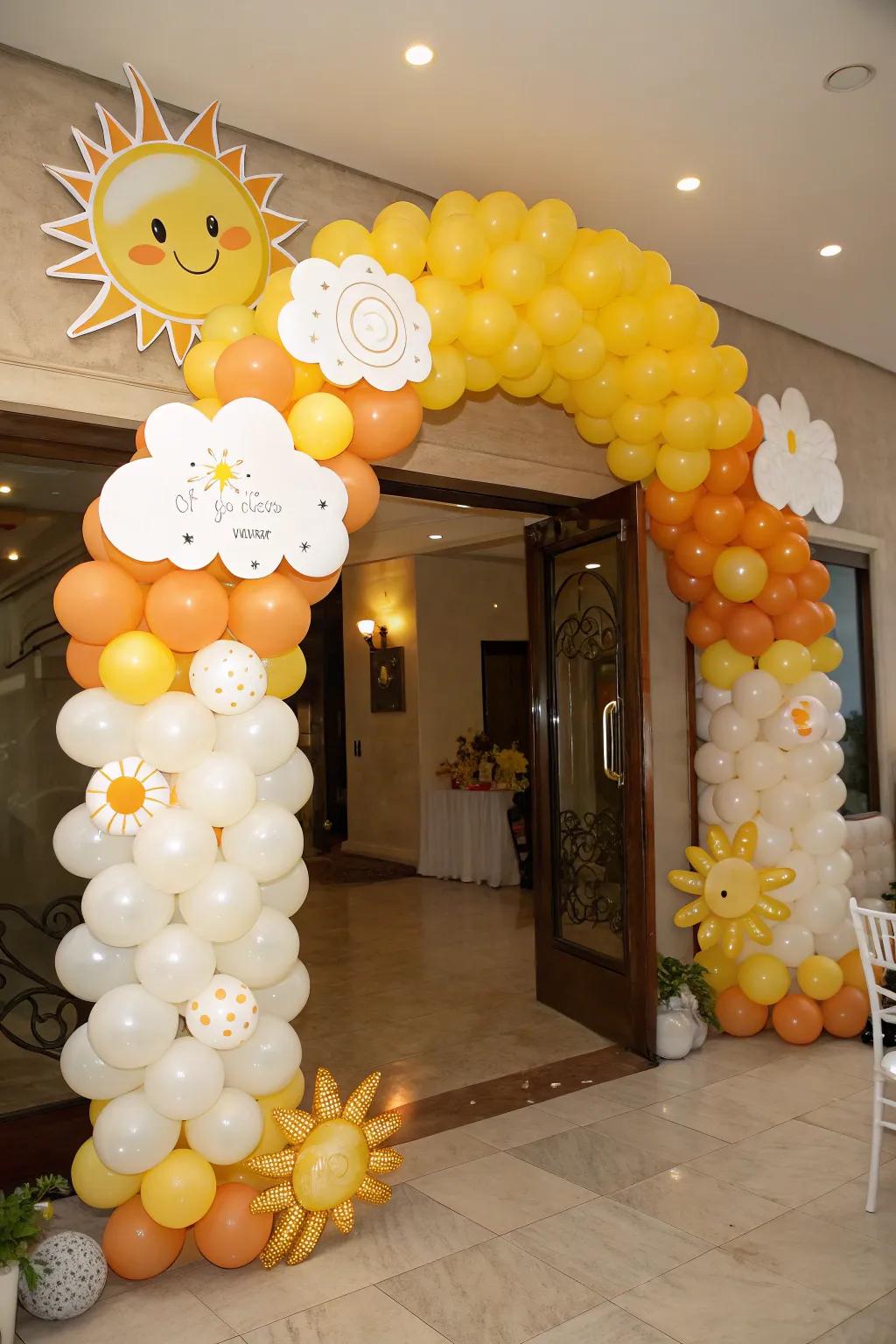 A cheerful balloon arch welcomes guests to the sunshine baby shower.
