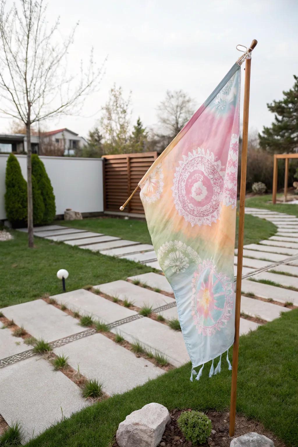 Elevate your garden with a touch of artistry—discover the beauty of tie-dye flags.