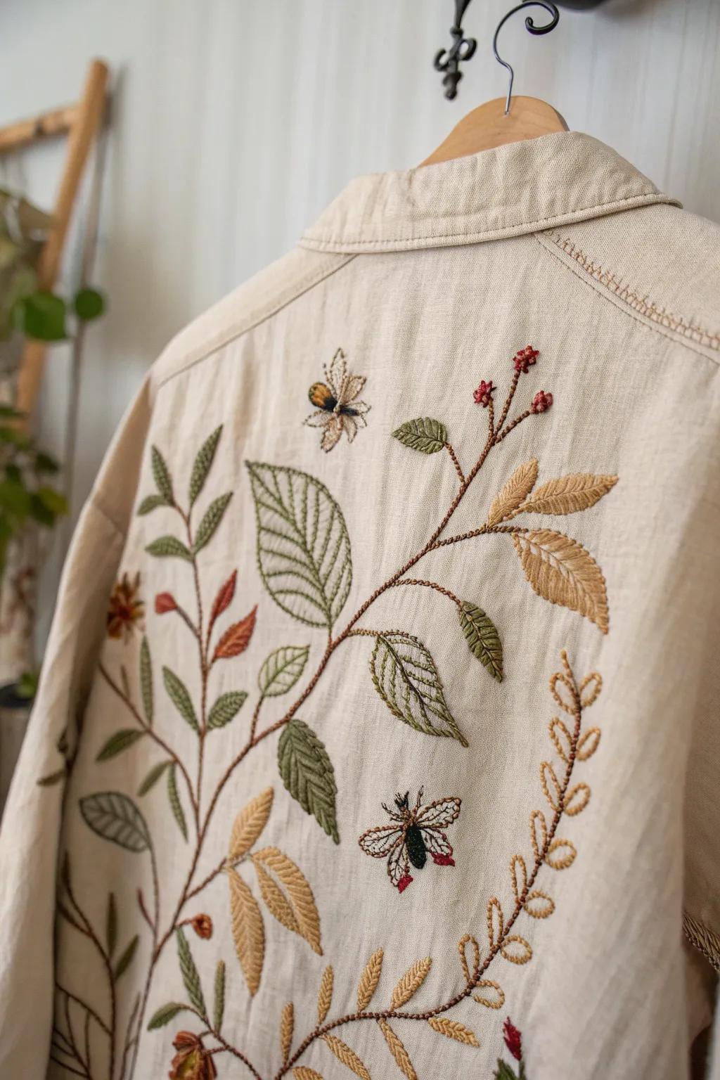 Revitalize your wardrobe with nature's touch: discover the art of visible mending with delicate leaf and vine patterns.