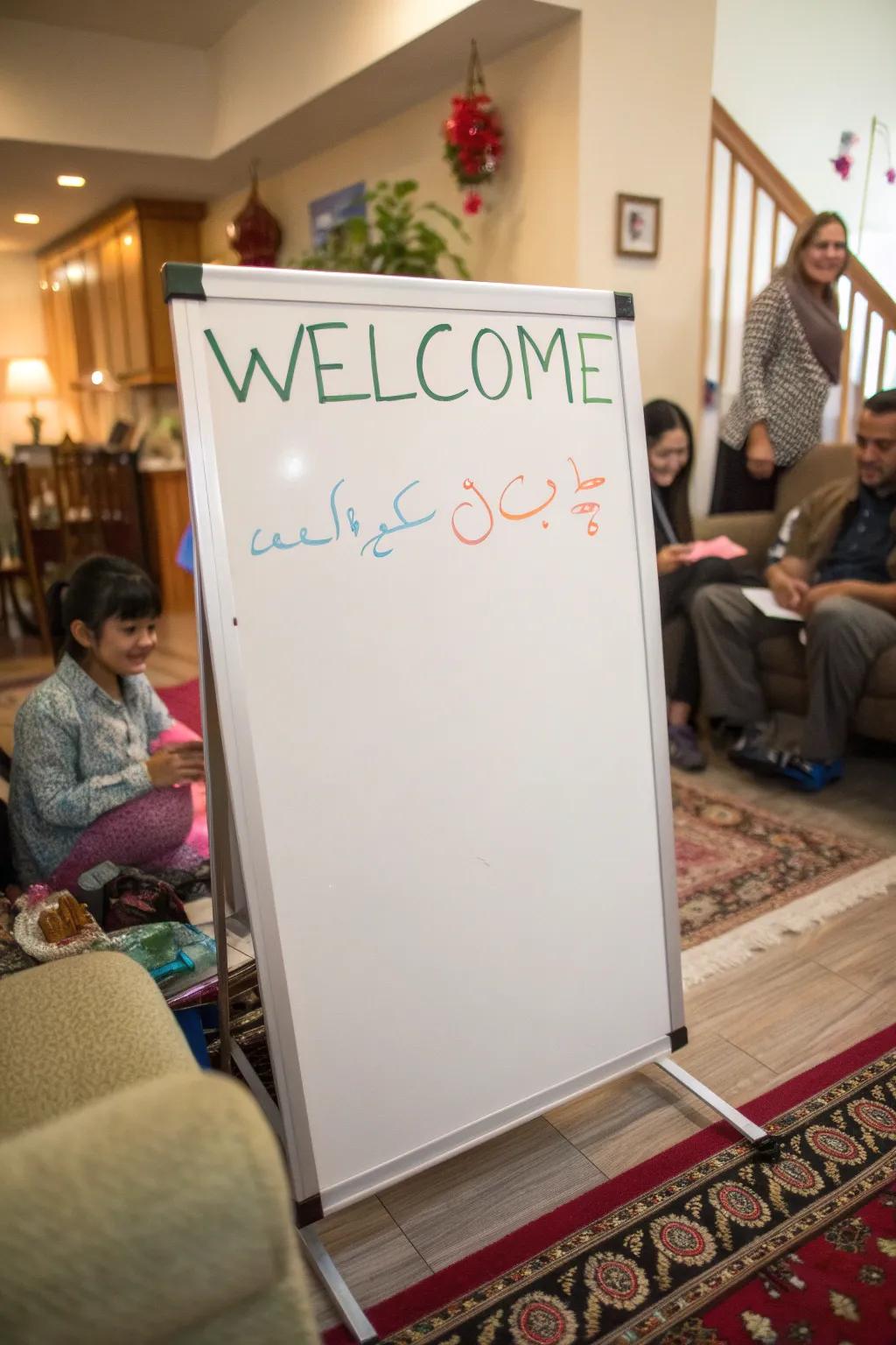 A multicultural welcome message on a whiteboard.