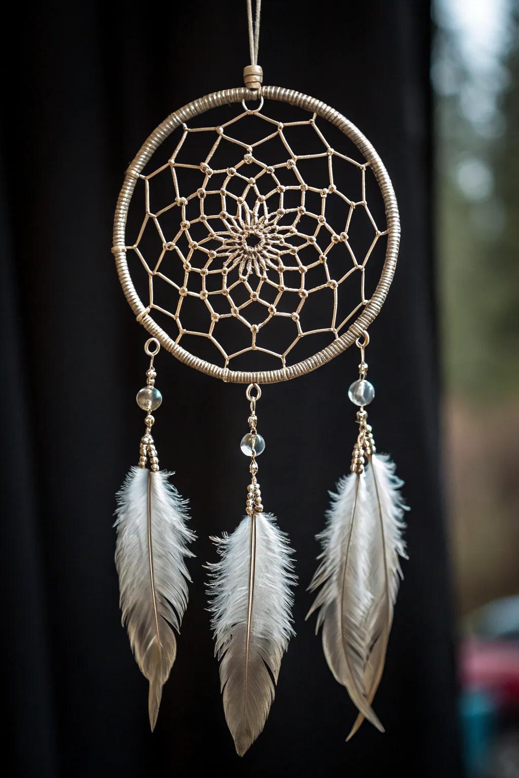 Capture dreams and traditions with this stunning wire dreamcatcher, a testament to skilled craftsmanship.