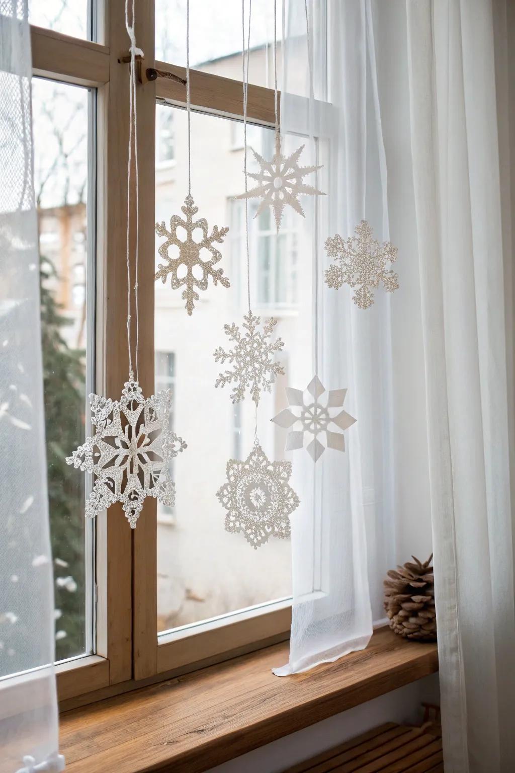 Embrace the magic of winter with a handcrafted snowflake mobile that dances in the light.