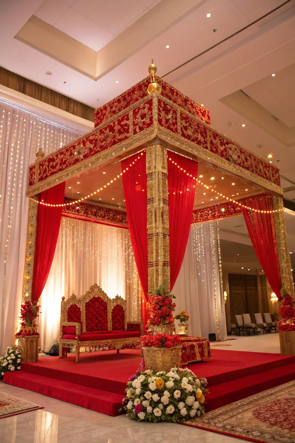 A red and gold mandap exudes luxury and grandeur.