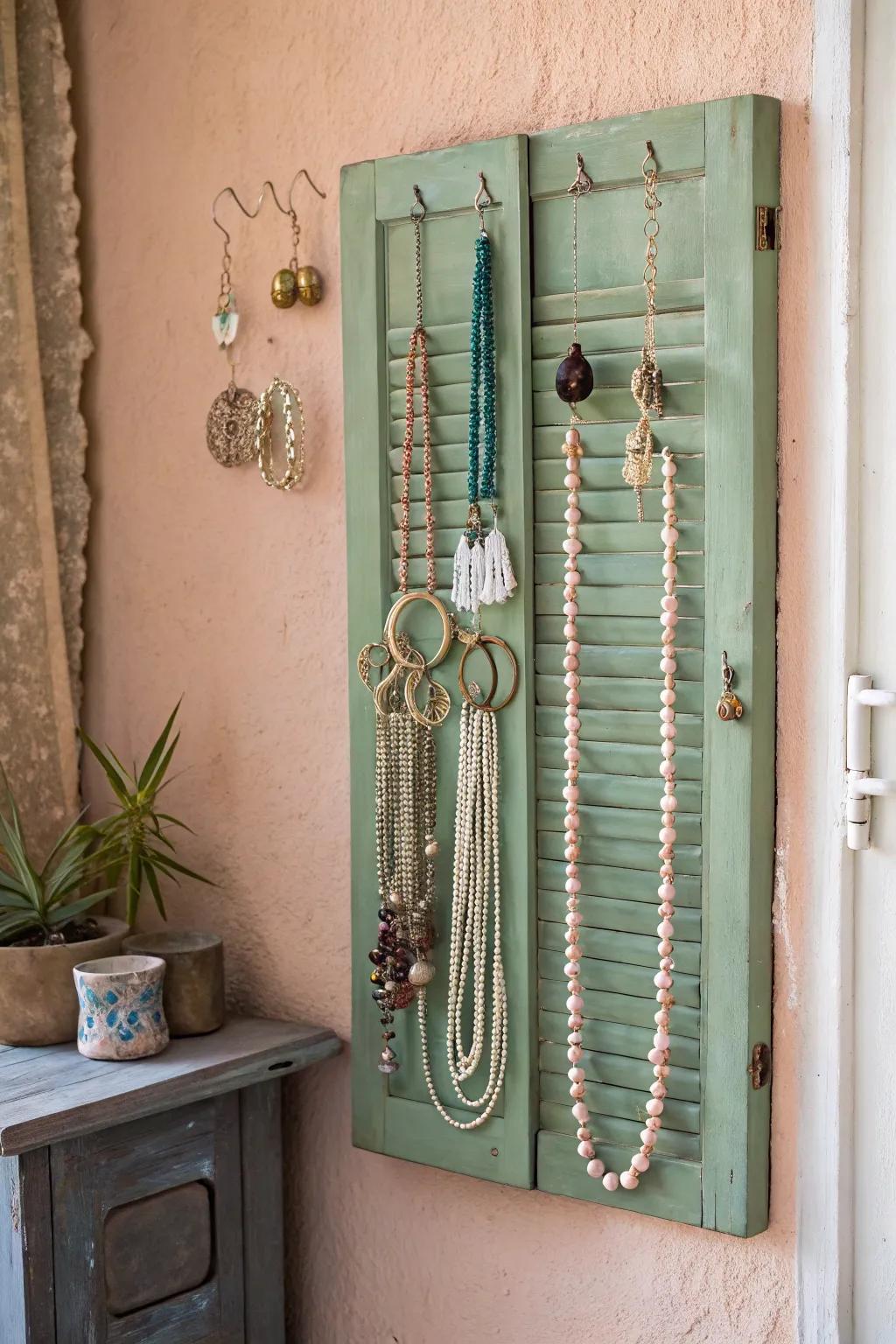 Transform your space with a touch of boho elegance—this shutter jewelry organizer is both playful and chic!