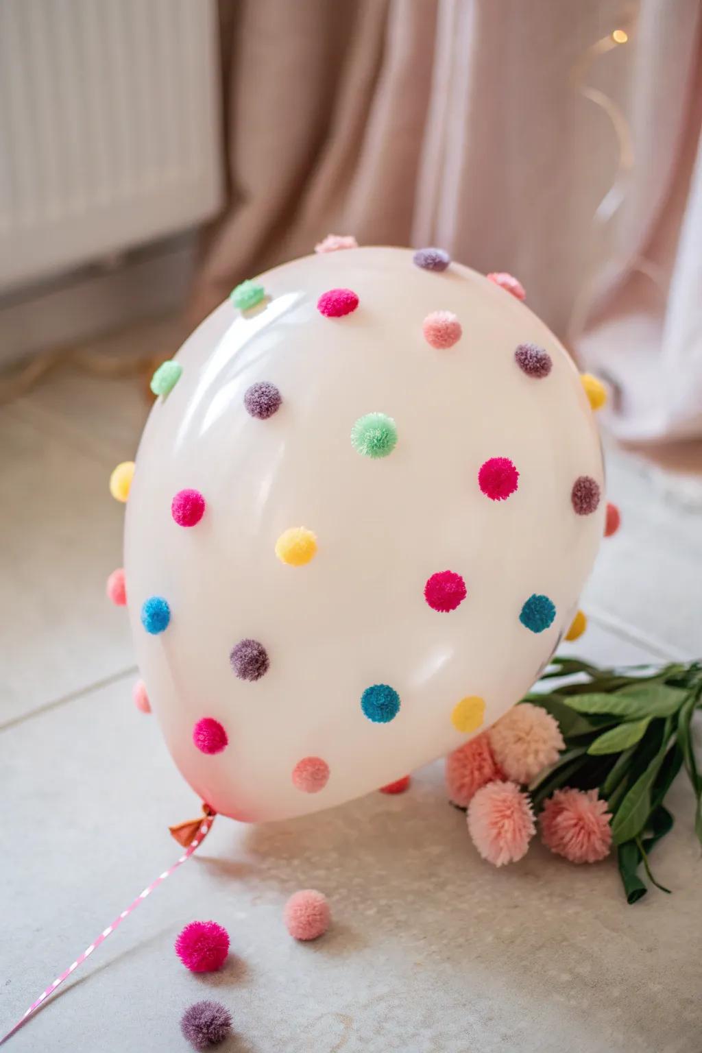 Elevate your space with the whimsical elegance of pom-pom balloons, where simplicity meets playful craftsmanship.