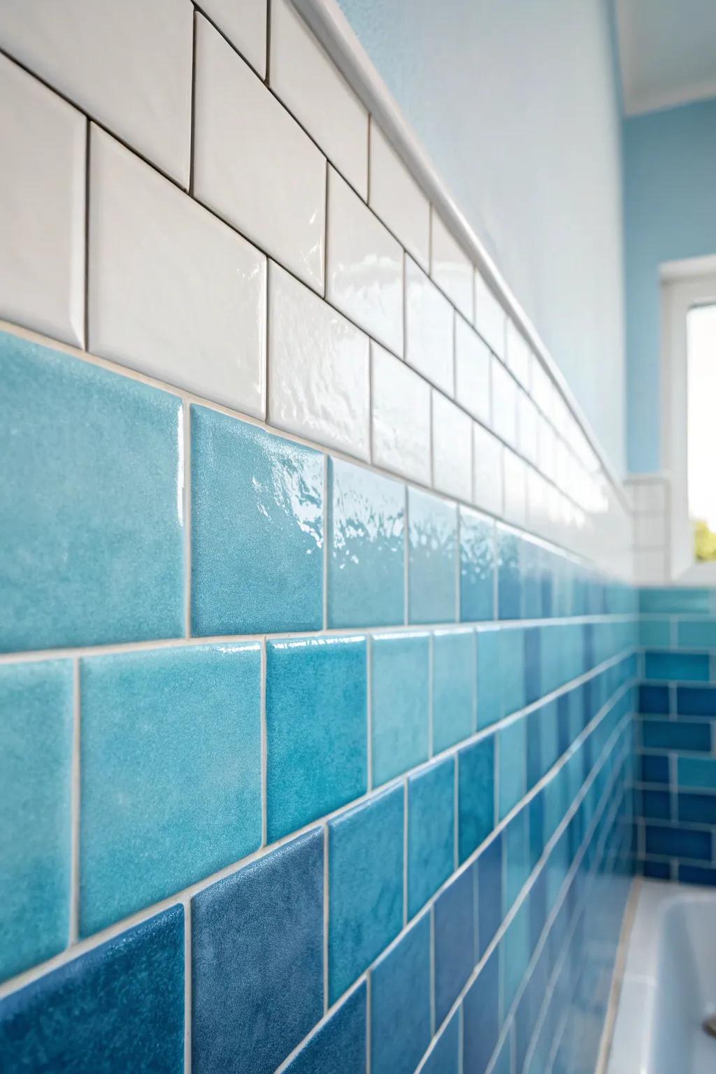Transform your bathroom with a soothing blue gradient tile design for a touch of minimalist elegance.