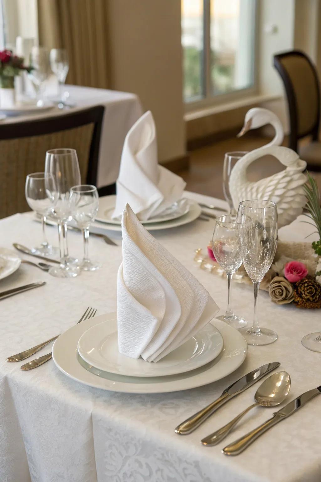 Swan folds bring grace and elegance to any occasion.