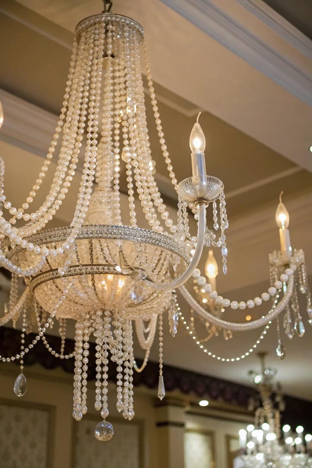 Elevate your lighting with pearl-decorated chandeliers.