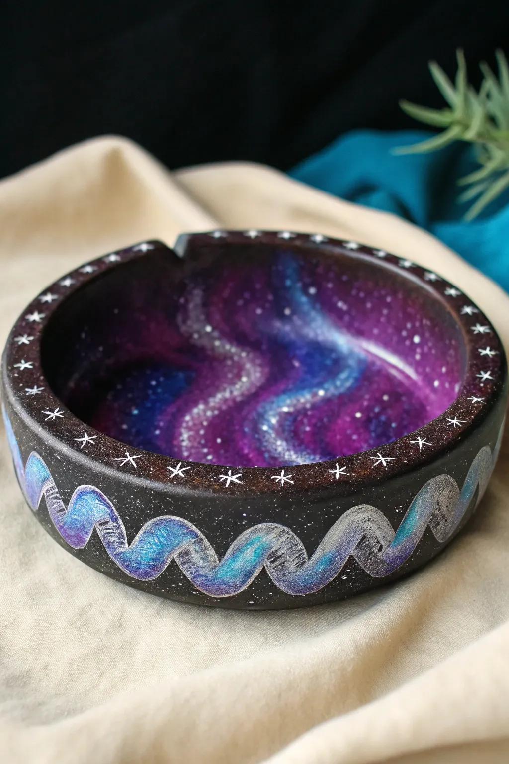 Hold the universe in your hands with this stunning galaxy-themed ashtray.