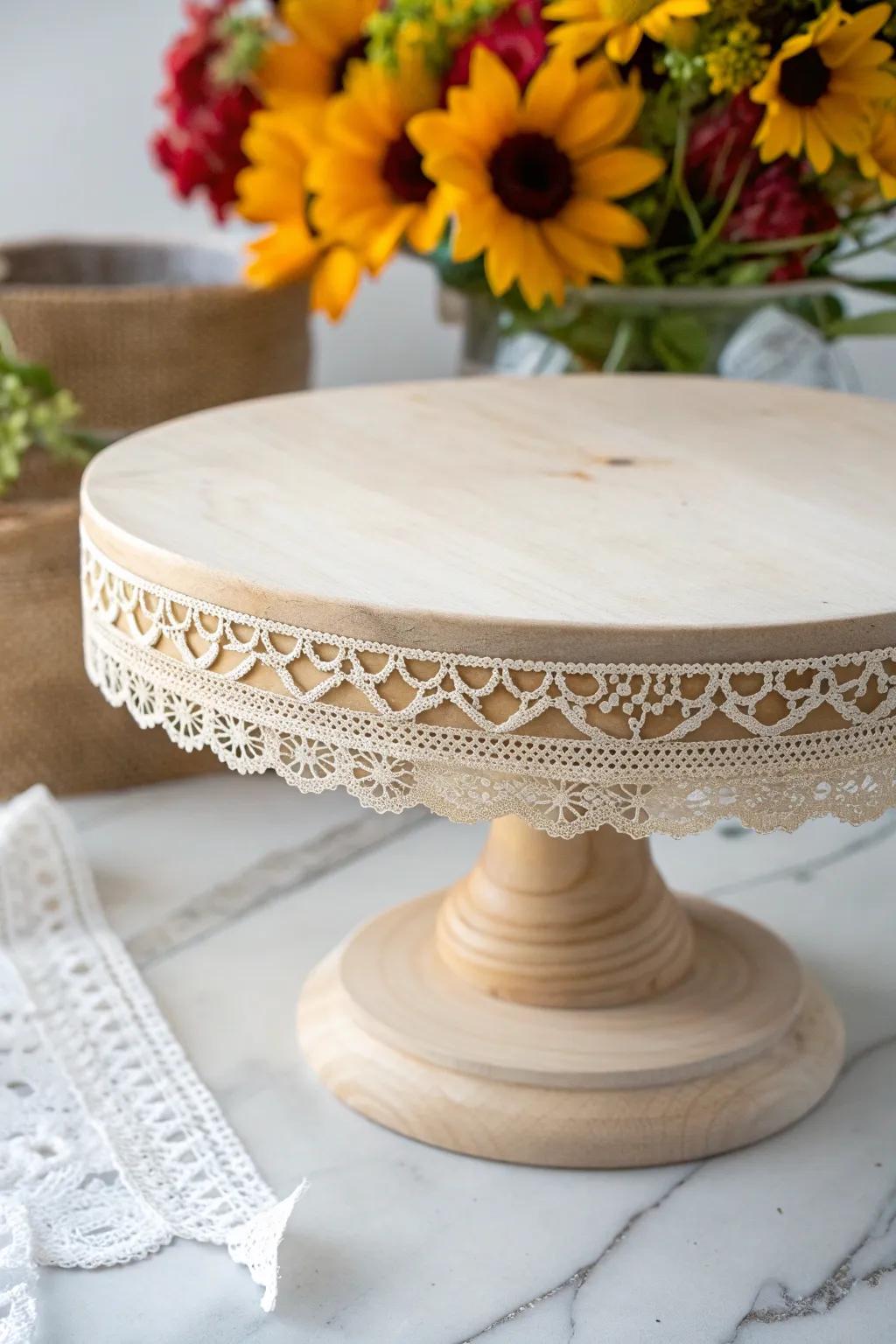 Elevate your dessert display with a touch of vintage elegance: a lace-trimmed cake stand that embodies simplicity and charm.