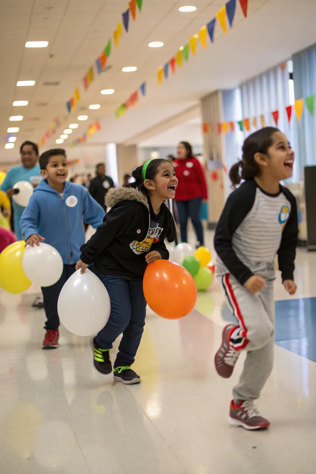 Kids having fun in a challenging penguin waddle relay.