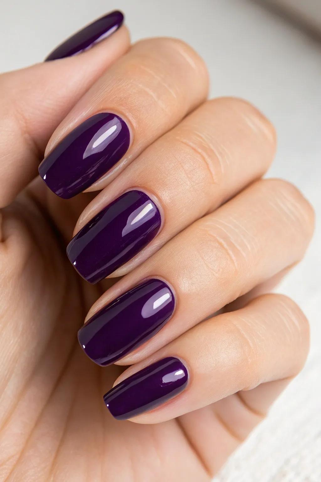 Embrace the mystery with daring dark purple nails.