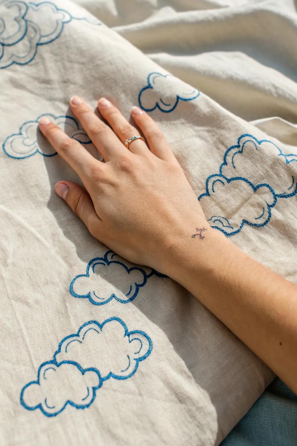 Capture the serenity of a clear sky with whimsical clouds on your skin. A reminder to embrace light-heartedness and simplicity every day.