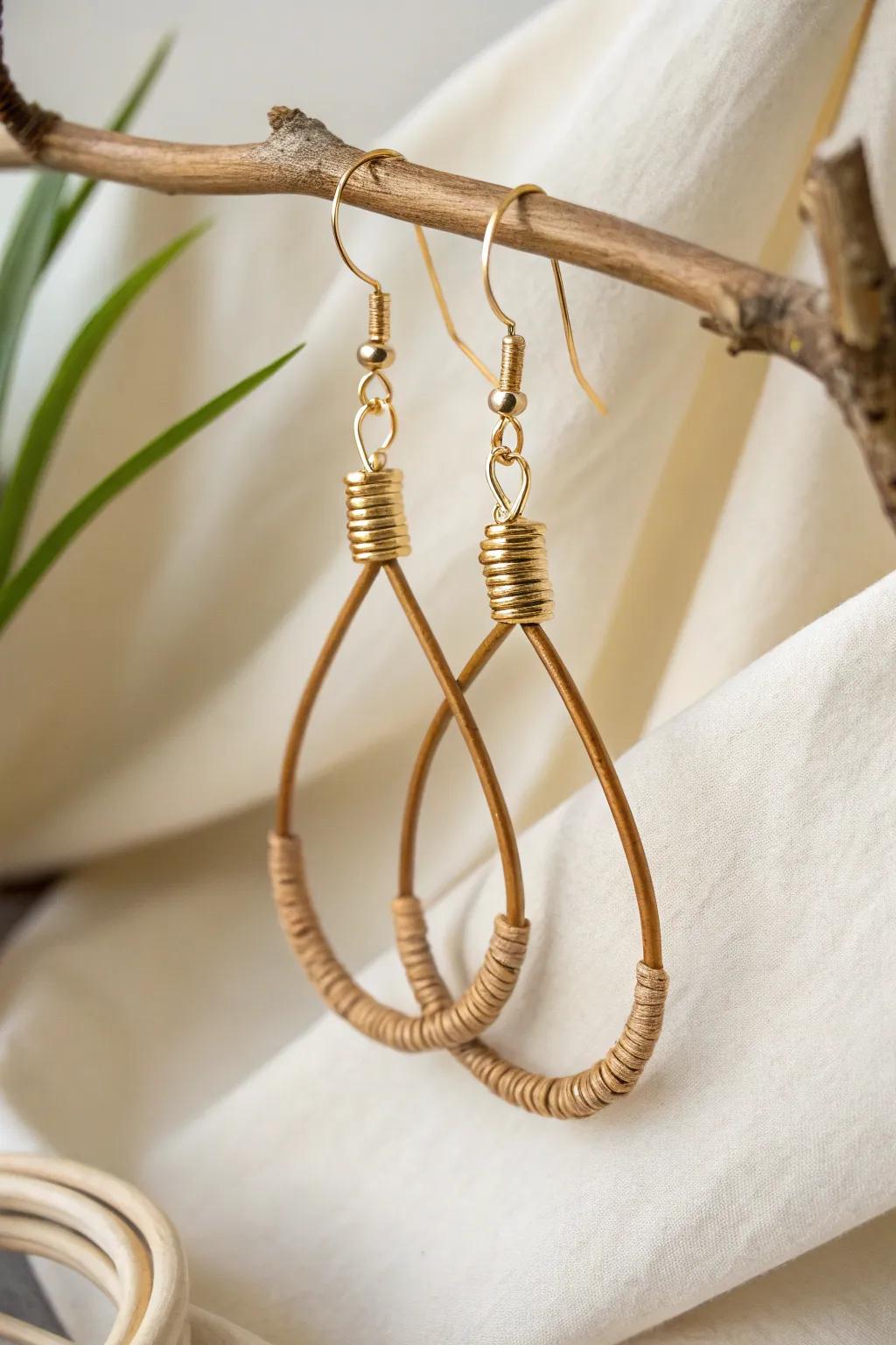 Explore the art of fusion with these stunning wire and leather earrings.