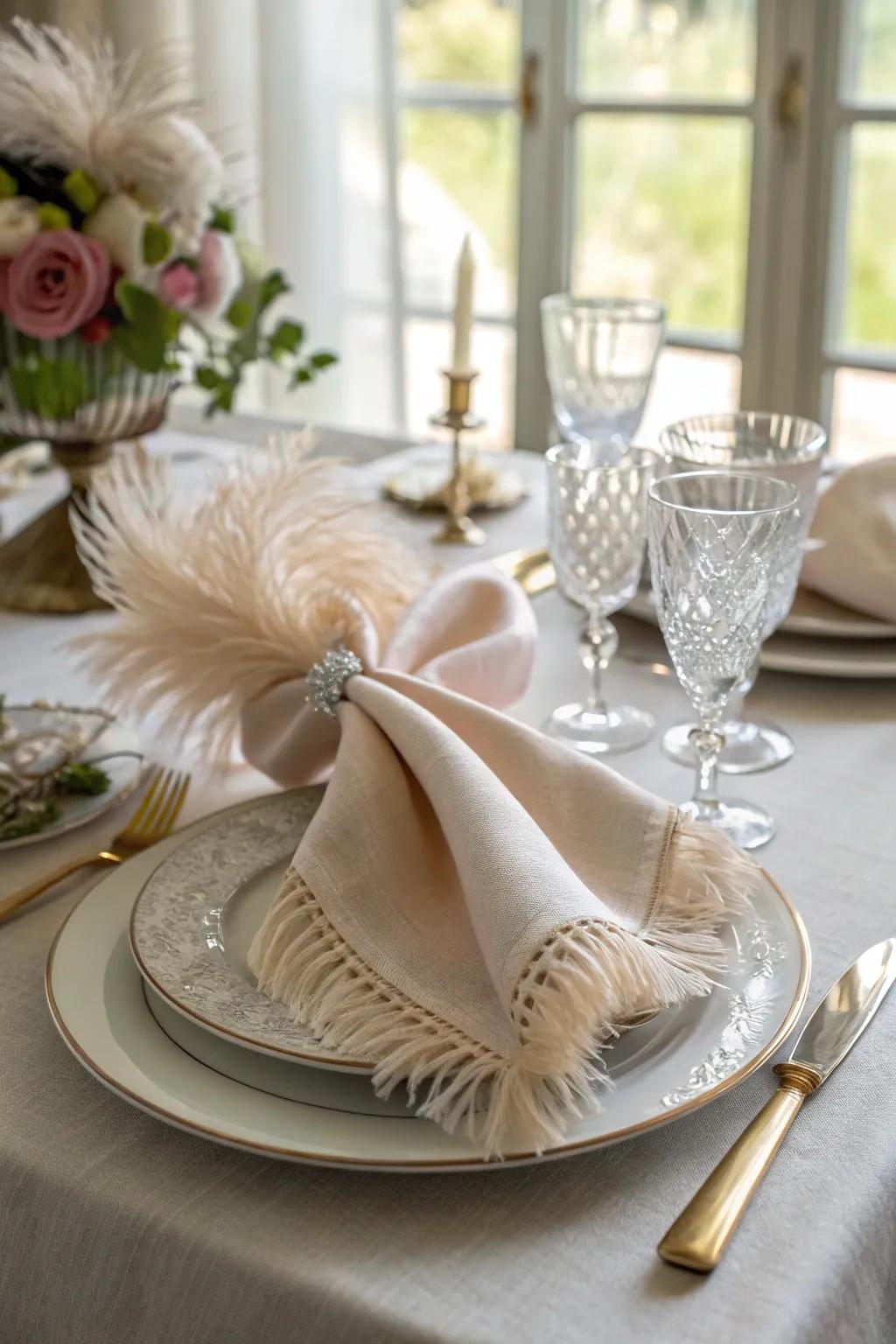 A silk napkin with a feathered edge fold, creating a soft and luxurious look on your table.