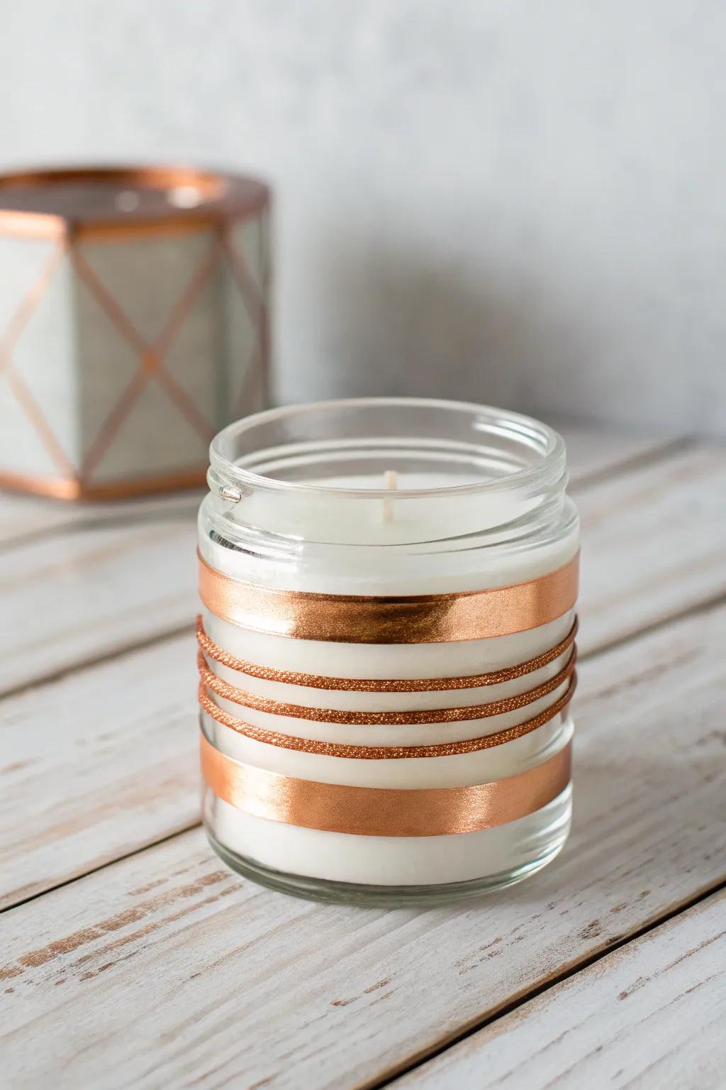 Add a touch of industrial elegance to your space with chic copper tape accents on your candle jars.
