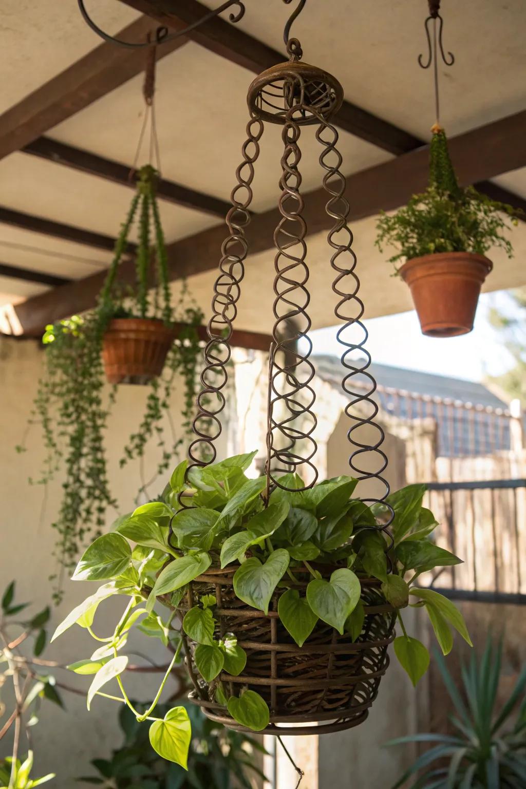 Elevate your indoor jungle with a boho twist: a repurposed box spring plant holder.