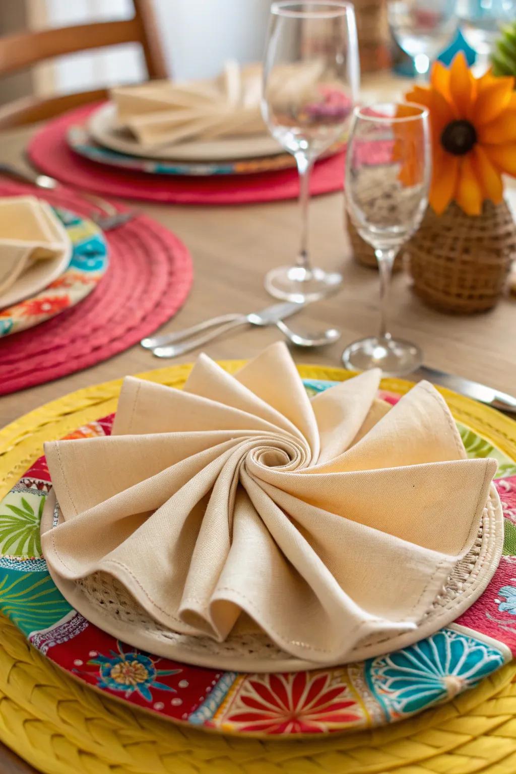 A silk napkin folded into a pinwheel, adding a joyful and festive touch to your dining experience.