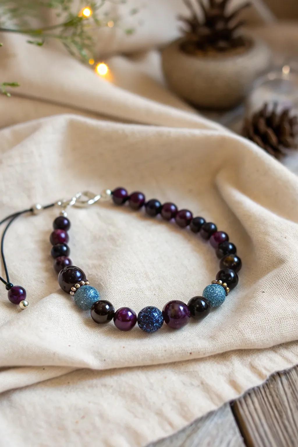 Dance under the stars with your own piece of the galaxy — a handcrafted glow-in-the-dark bracelet that captures the beauty of the night sky.