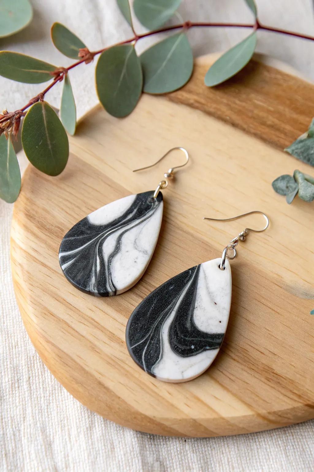 Elevate your style with the timeless elegance of marble-effect clay earrings. Handcrafted simplicity at its finest.