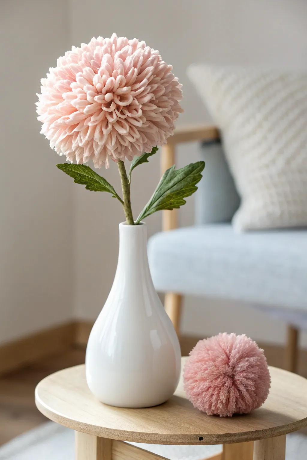 Bring everlasting spring into your home with these delightful pom pom yarn flowers!