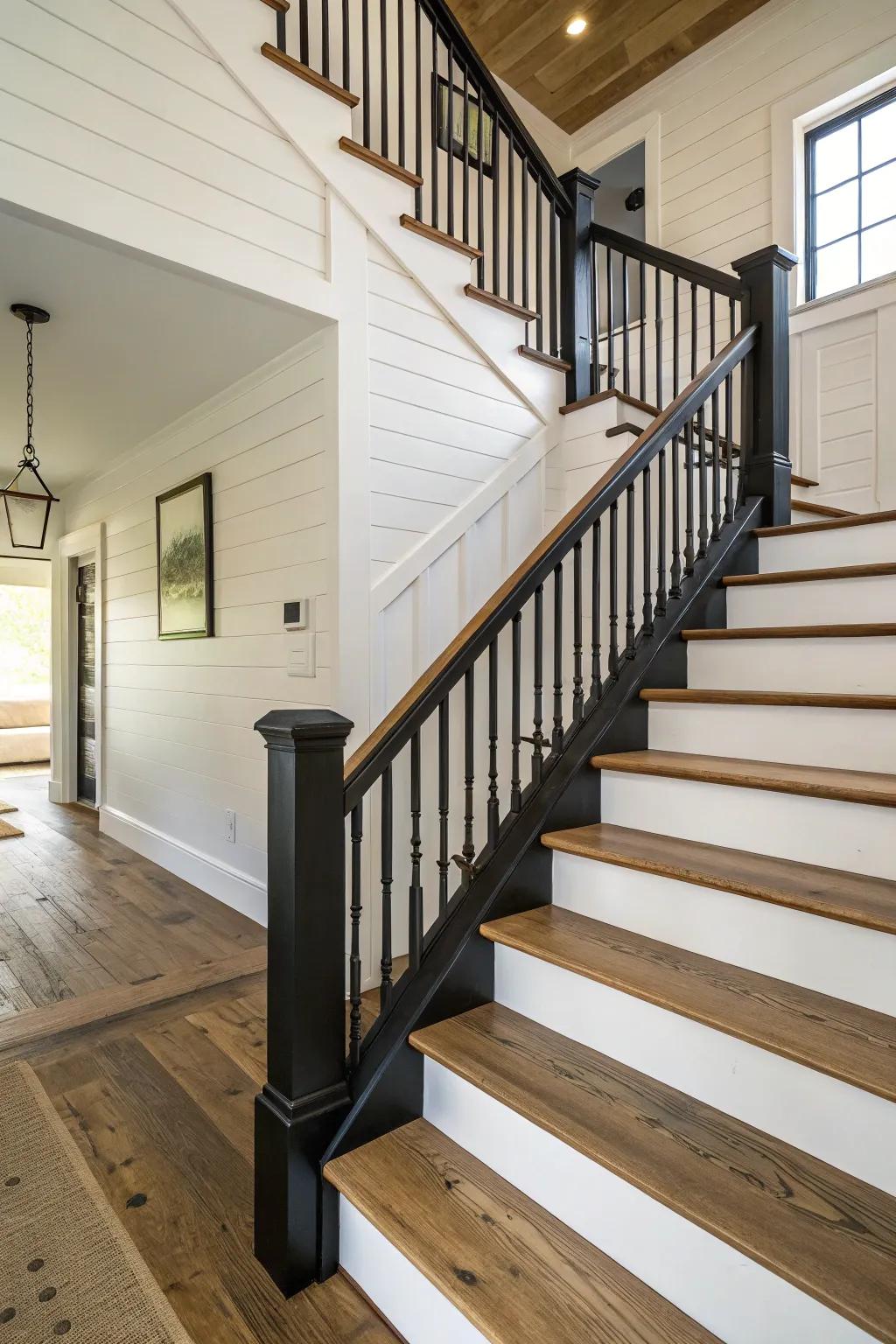 Black-painted railings offer a bold contrast in farmhouse interiors.