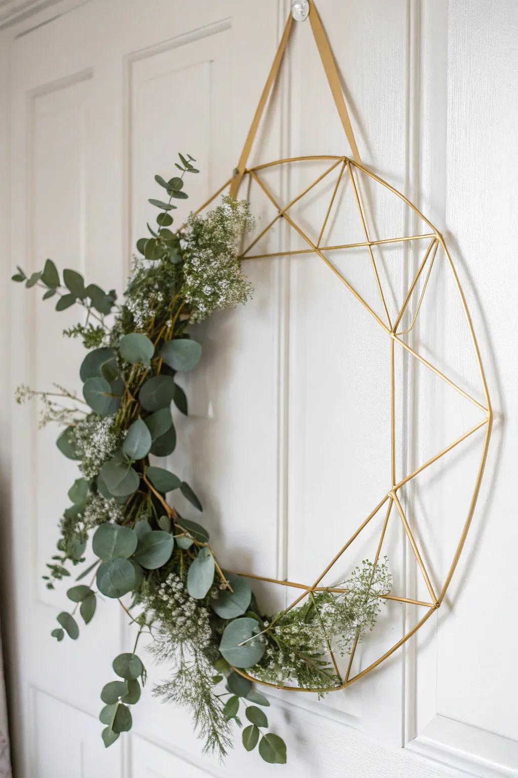 Embrace the elegance of simplicity with a modern geometric wreath that blends sleek metal lines with lush greenery.