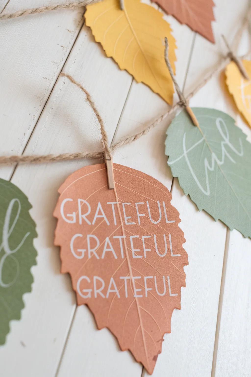 Celebrate gratitude with a charming and simple DIY leaf garland, perfect for adding warmth and meaning to your Thanksgiving decor.