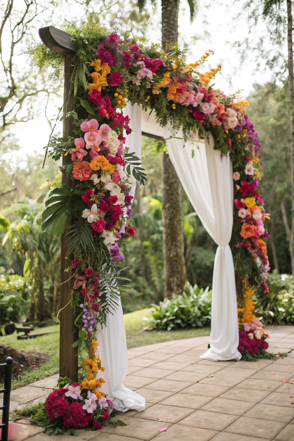 A stunning arch overflowing with vibrant tropical blooms.