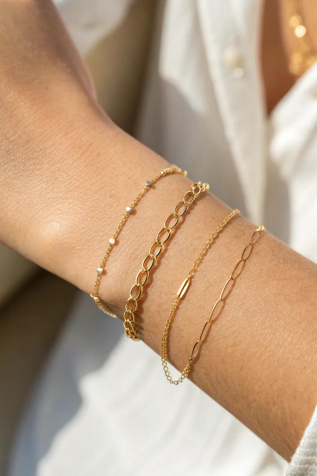Effortless elegance with minimalist charm: Perfectly layered delicate chains for a chic everyday look.