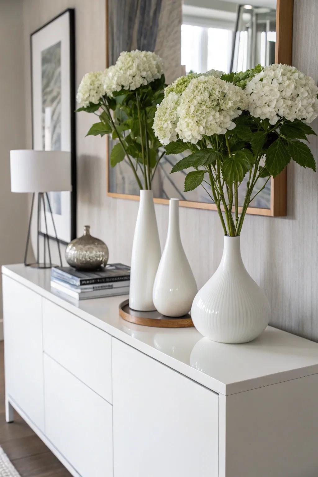 Single hydrangea stems bring modern minimalism to a stylish space.