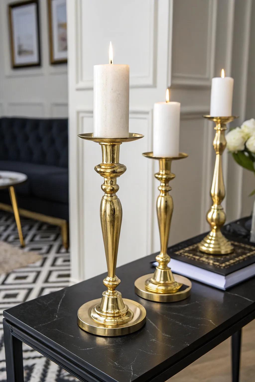 Glamorous gold candle holders bring warmth and elegance.