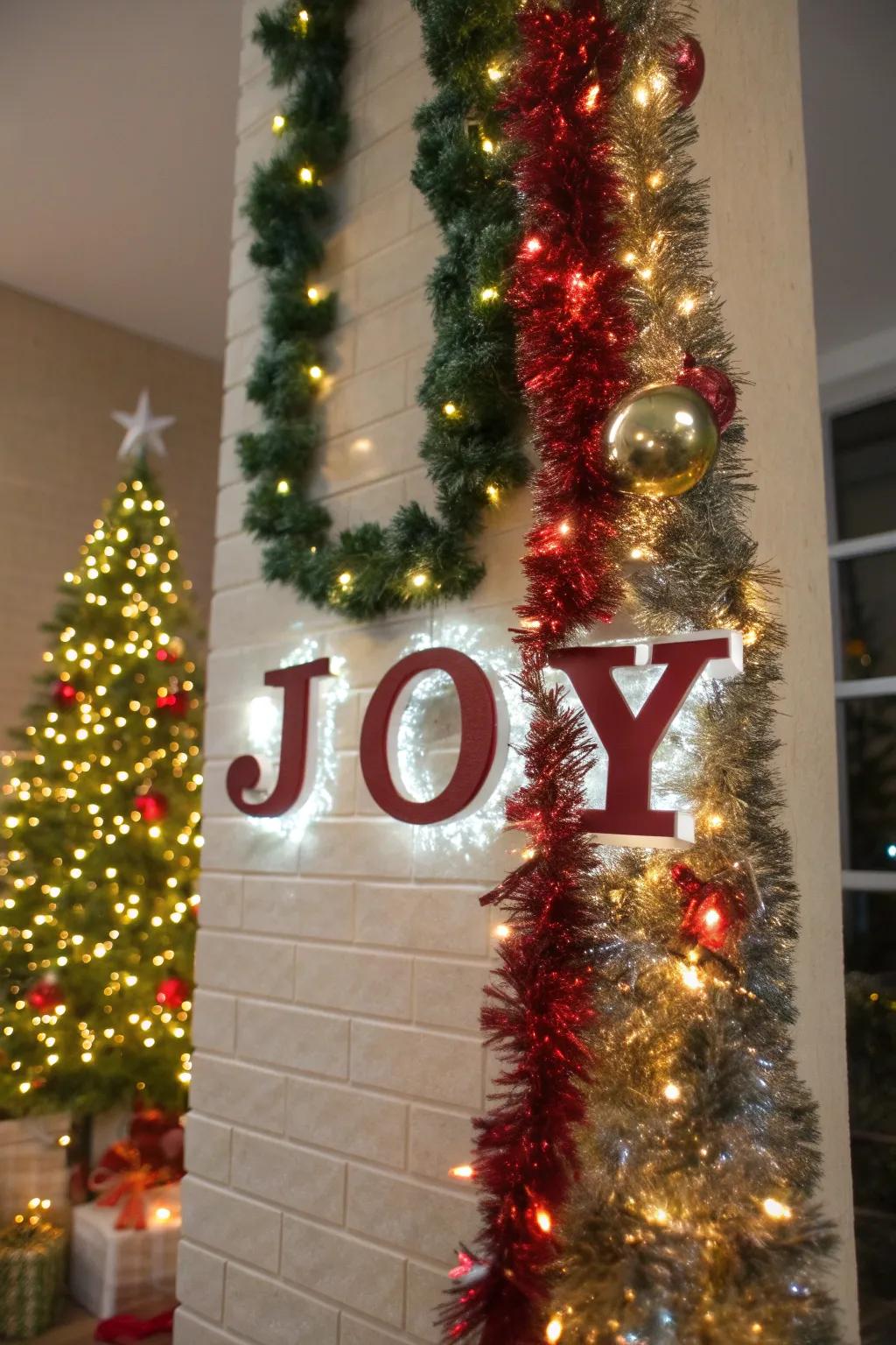 Tinsel wall art spells out 'JOY,' bringing a playful touch to holiday decor.