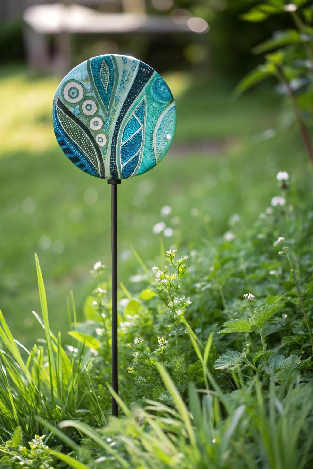 Illuminate your garden with a touch of artistry - discover the charm of fused glass stakes!