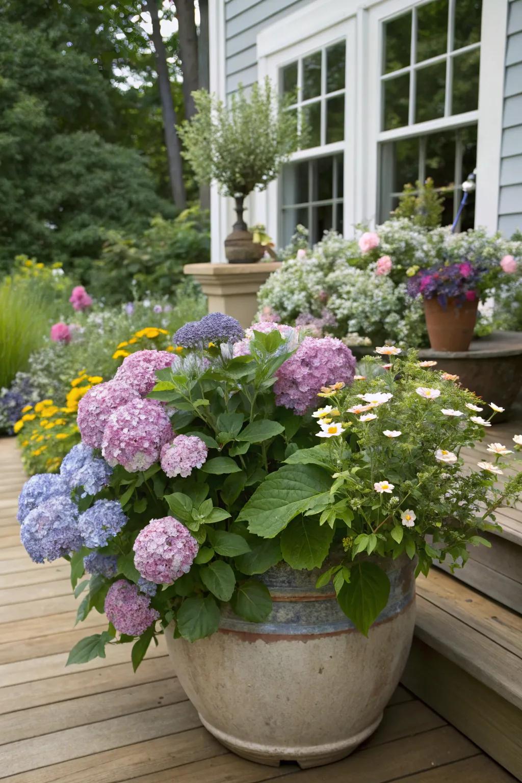 A ceramic pot overflowing with hydrangeas and wildflowers for a garden feel.