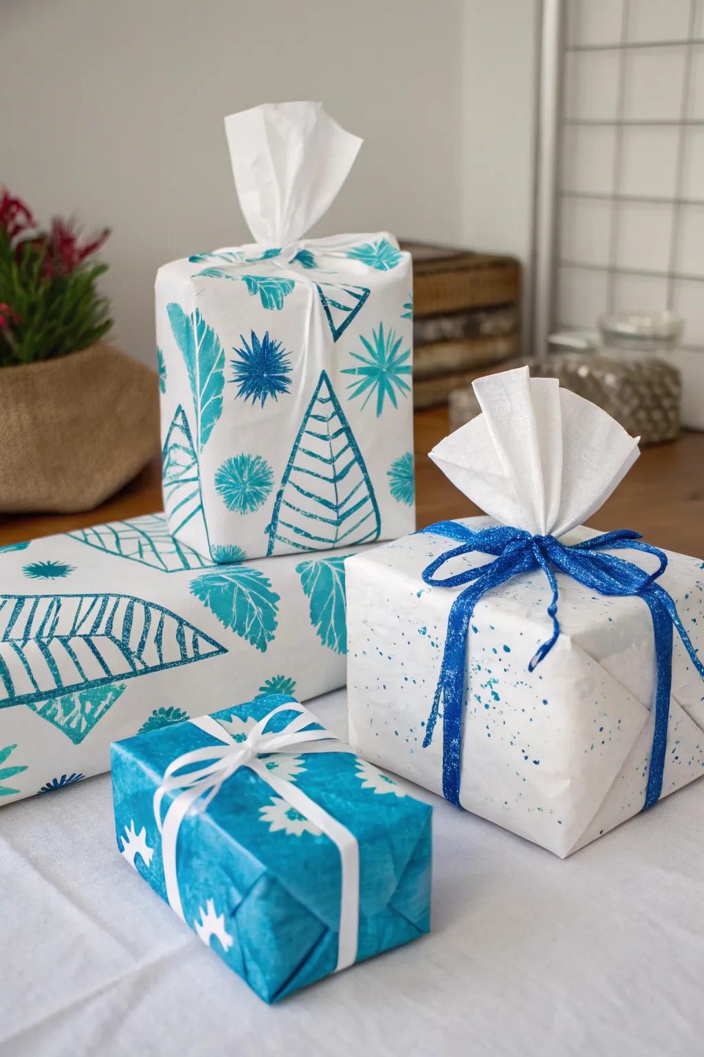 Uniquely wrapped gifts with white and blue materials.
