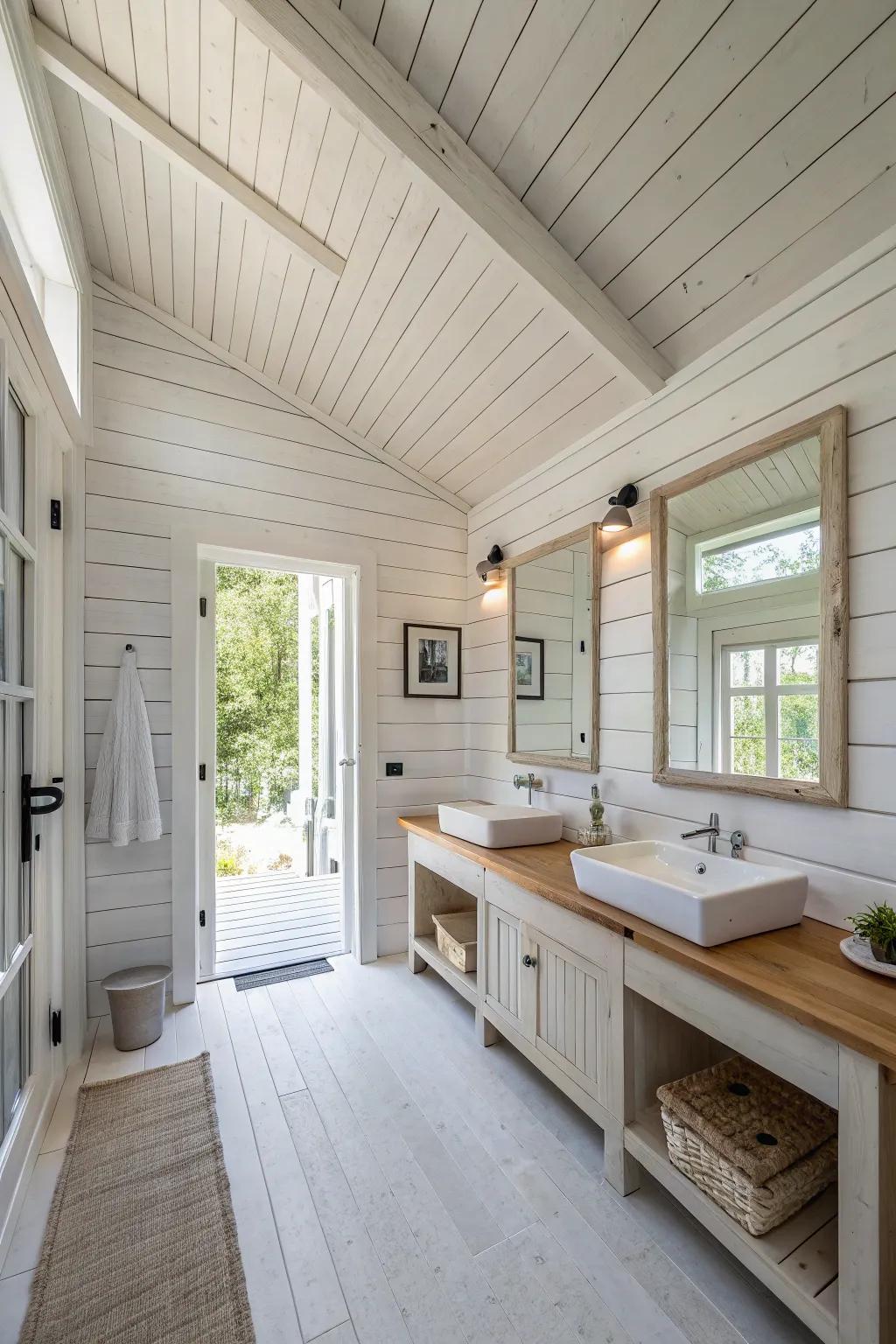 White wood paneling brightens up this inviting bathroom.