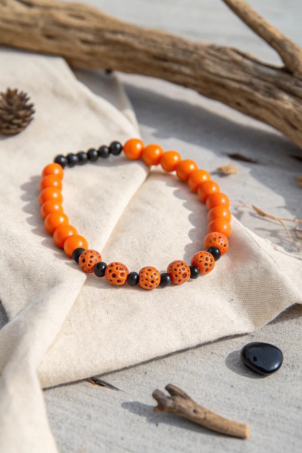 Celebrate Halloween with Scandinavian elegance and boho charm through this delightful jack-o'-lantern inspired clay bead bracelet.