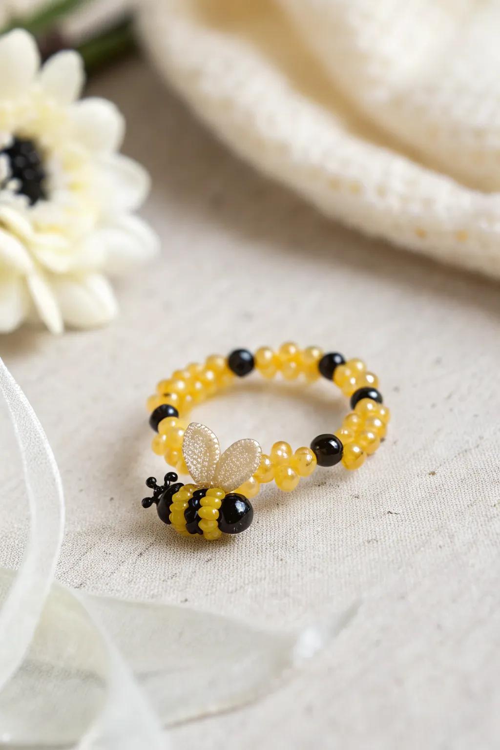 Create a buzz with this enchanting bumble bee beaded ring, a perfect blend of simplicity and elegance.