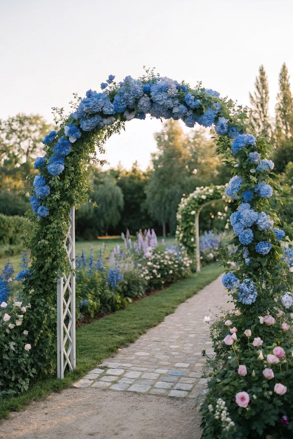 A dreamy wedding arch adorned with blue delphiniums.