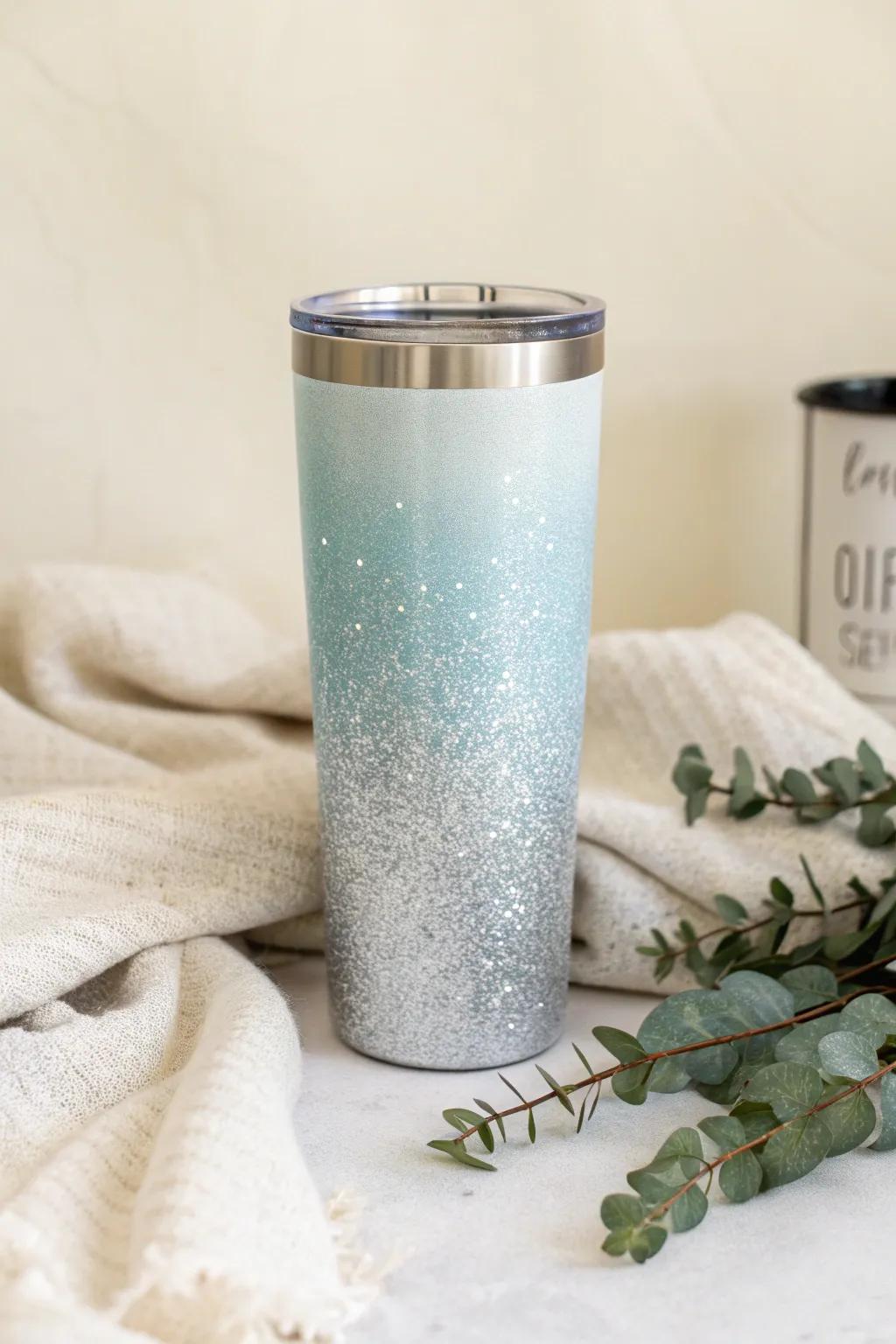 Embrace the elegance of winter with this stunning ombre glitter tumbler, perfect for adding a touch of frosty charm to any occasion.