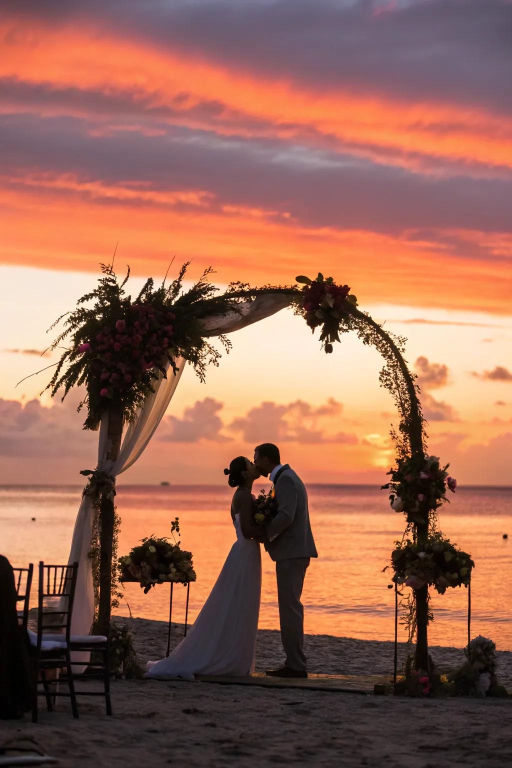 A stunning wedding arch set against a vibrant sunset backdrop.