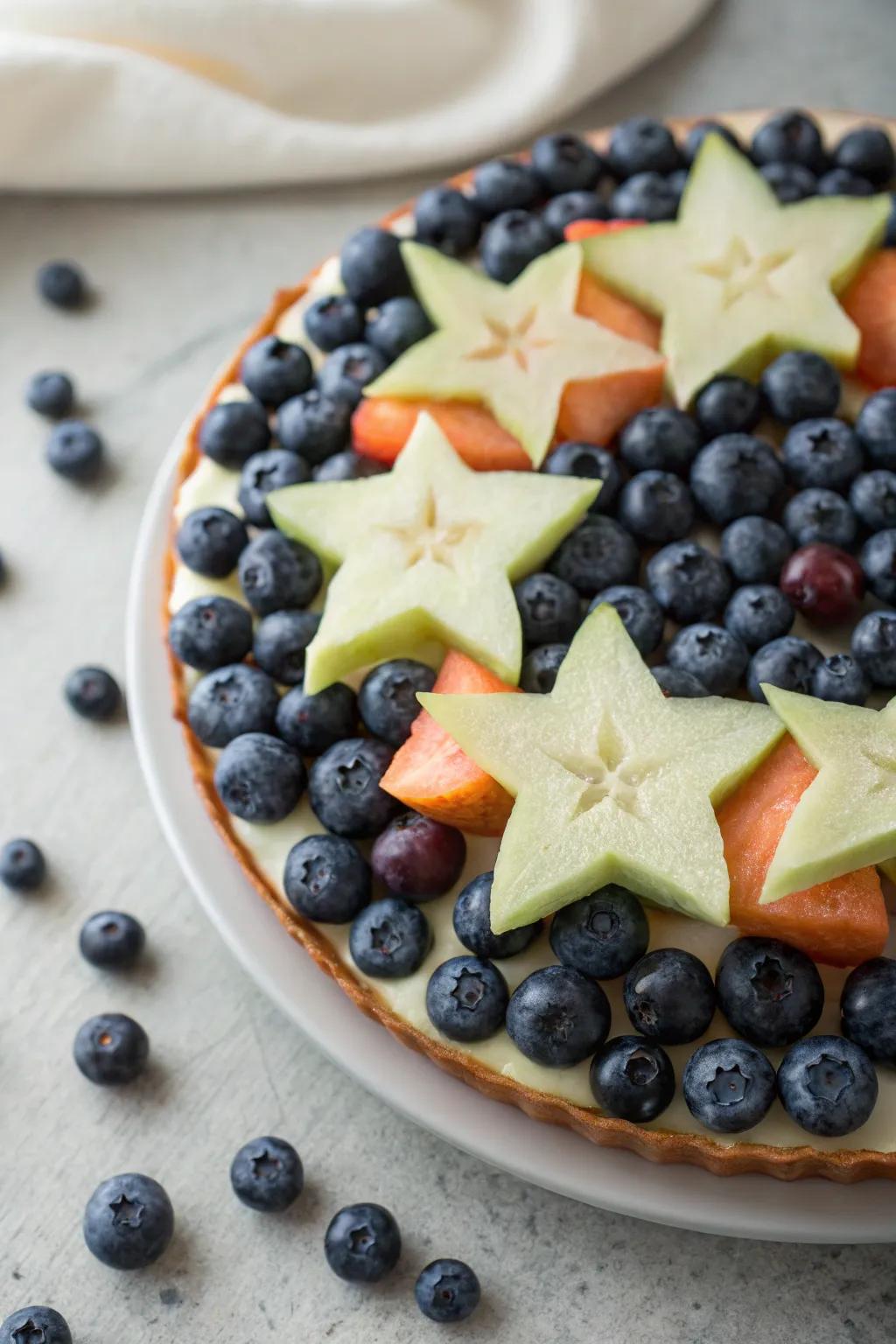 Elevate your table with a touch of magic: Starry Night fruit pizza design.