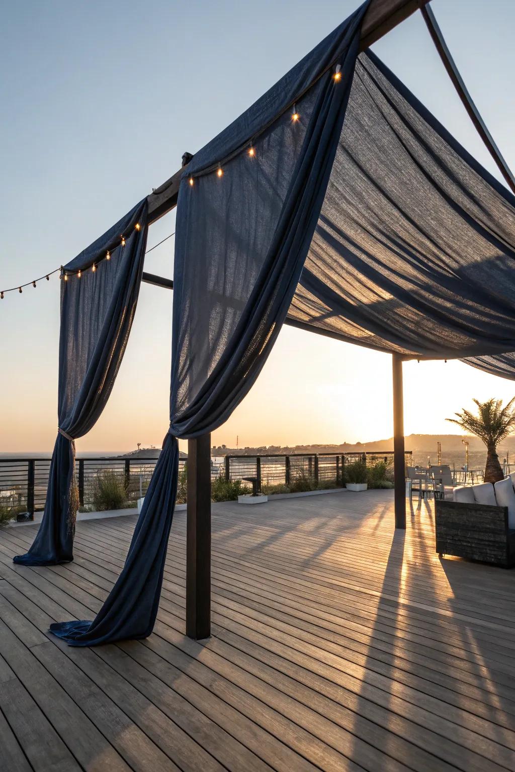 Transform your deck into a stylish retreat with a DIY fabric canopy. #DeckDesign #DIYInspiration